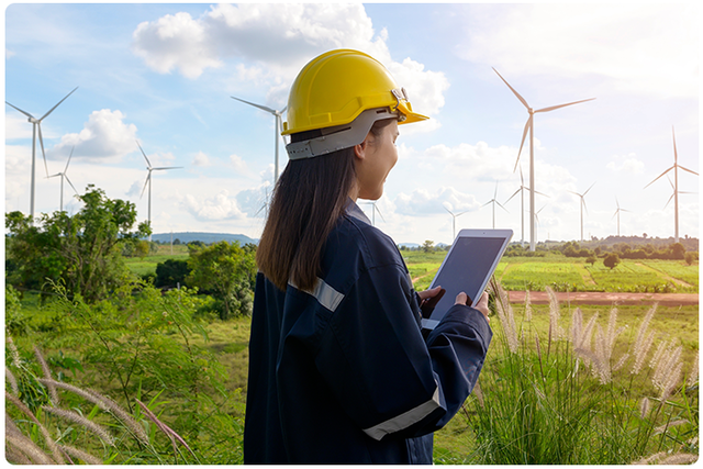 A frontline worker looks up safety data on a tablet.