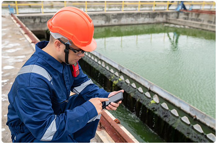 Water technician uses mobile software to monitor water quality
