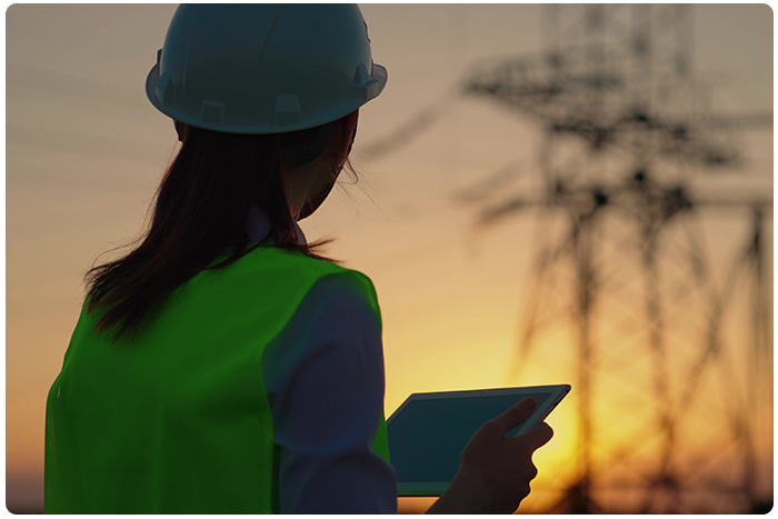 Frontline checks sustainability management software on her tablet while in the field.